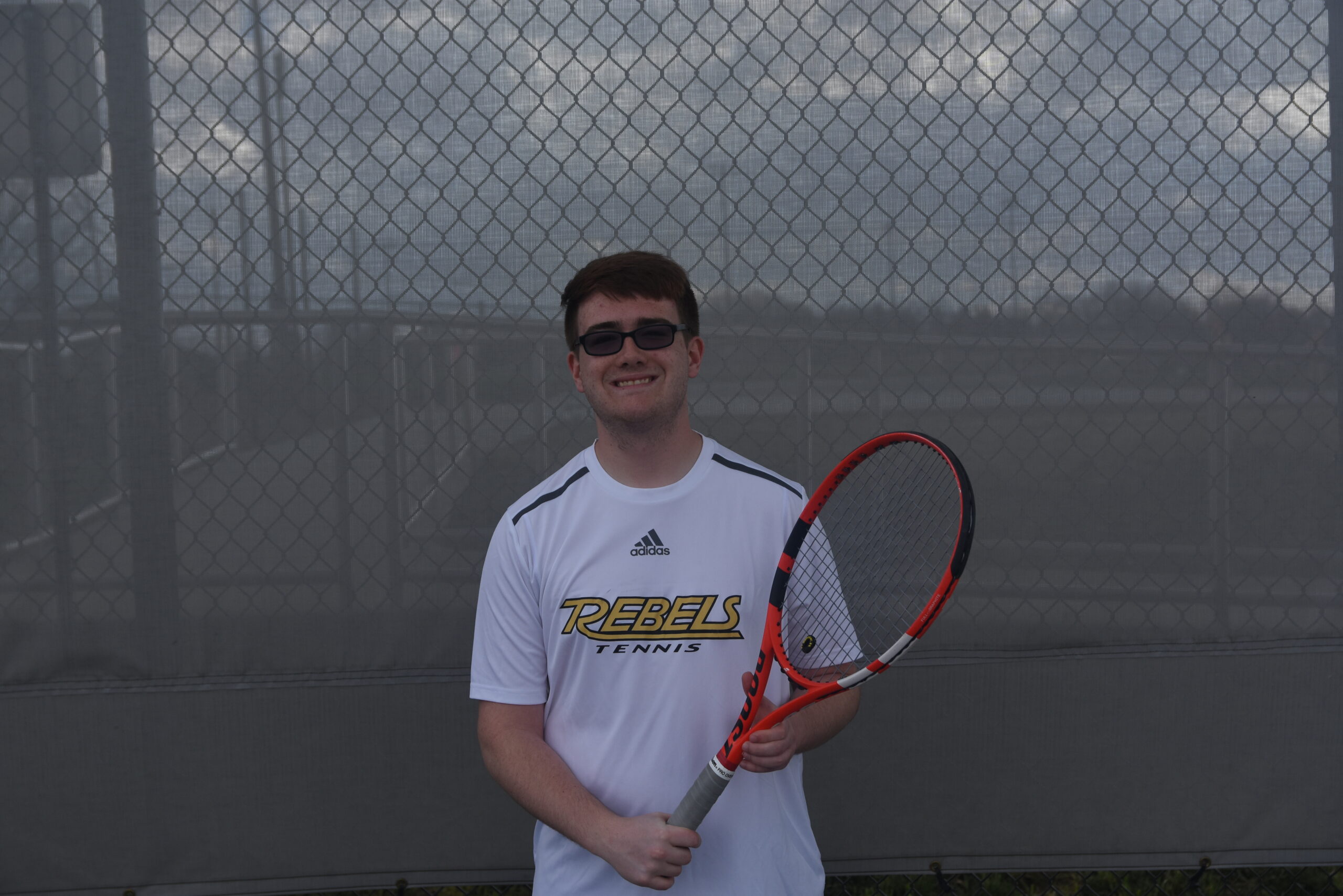 Boys tennis completes the sweep against the Raiders